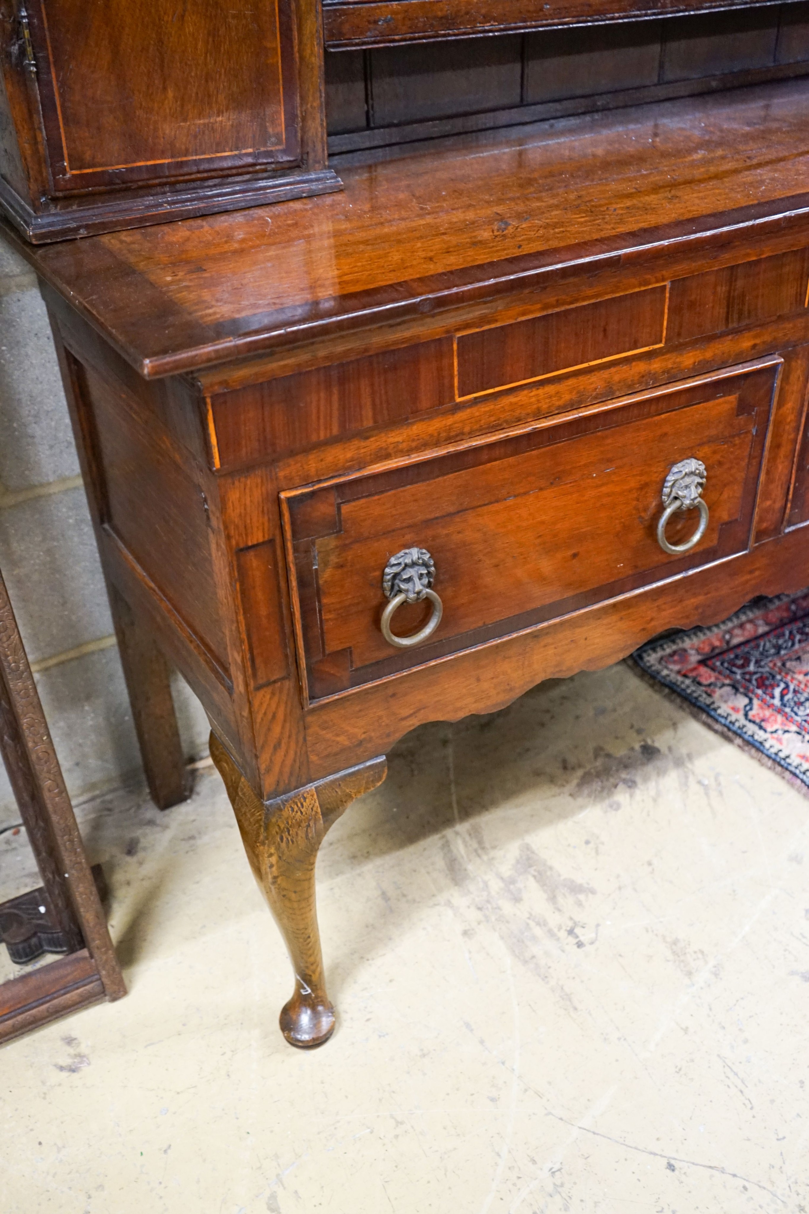 An 18th century oak and mahogany crossbanded dresser